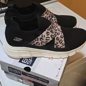 Skechers Women's Black and Animal Print Slip-On Sneakers